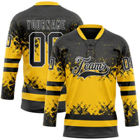 Custom Black Yellow-White Abstract Splatter Paint Hockey Lace Neck Jersey